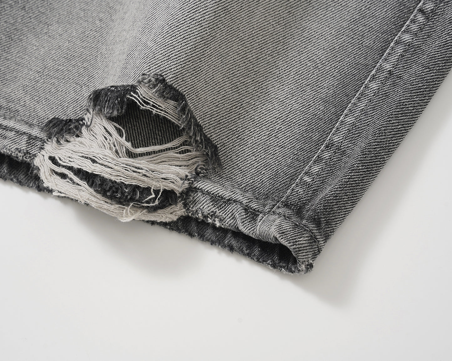 denim shorts holed